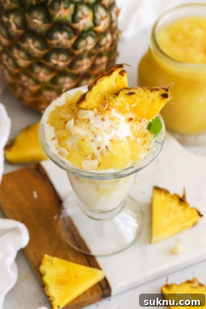 Vanilla ice cream with pineapple sauce