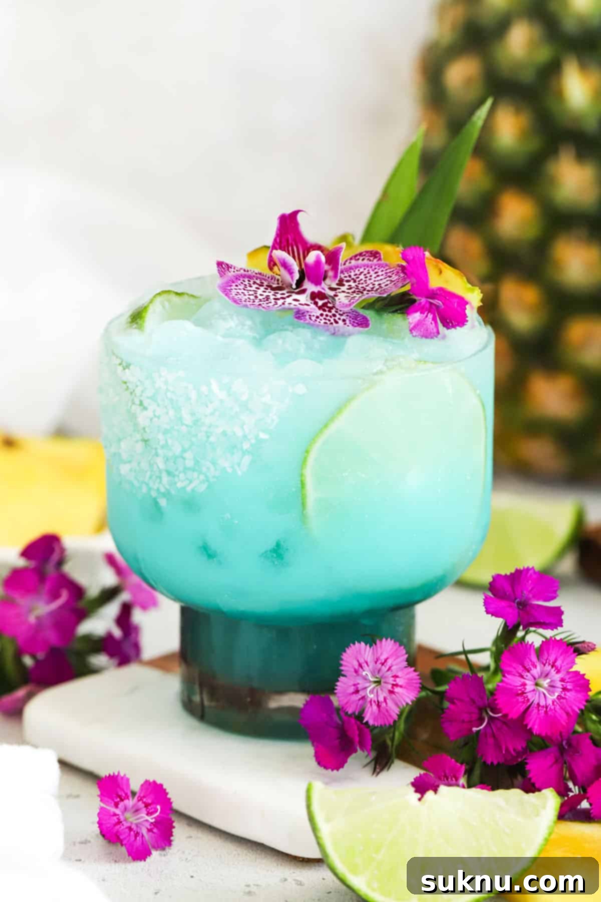 virgin blue hawaiian drink in a smoky glass