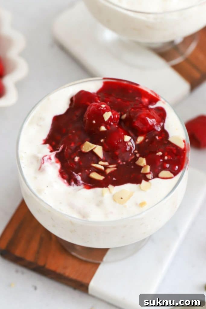 A bowl of risalamande (Danish rice pudding) with raspberry sauce