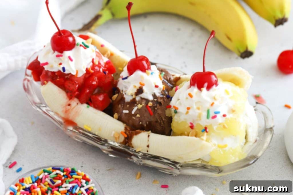 Peachy Dream Shake 9 Homemade banana split with strawberry sauce, hot fudge, and pineapple topping, topped with whipped cream and cherries.