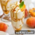 Peachy Dream Shake 10 Two homemade peach milkshakes in tall milkshake glasses.