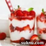 Small dishes of Strawberry Eton Mess with fresh mint