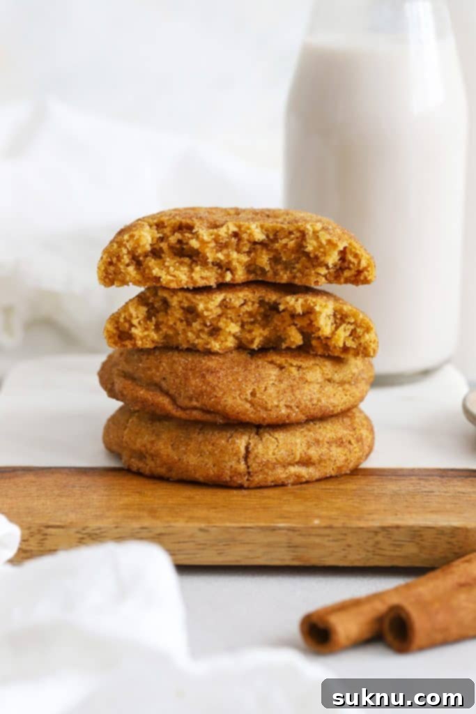 Autumn Spice Gluten-Free Pumpkin Oat Cookies 9 A stack of perfectly baked gluten-free pumpkin snickerdoodles dusted with cinnamon sugar.