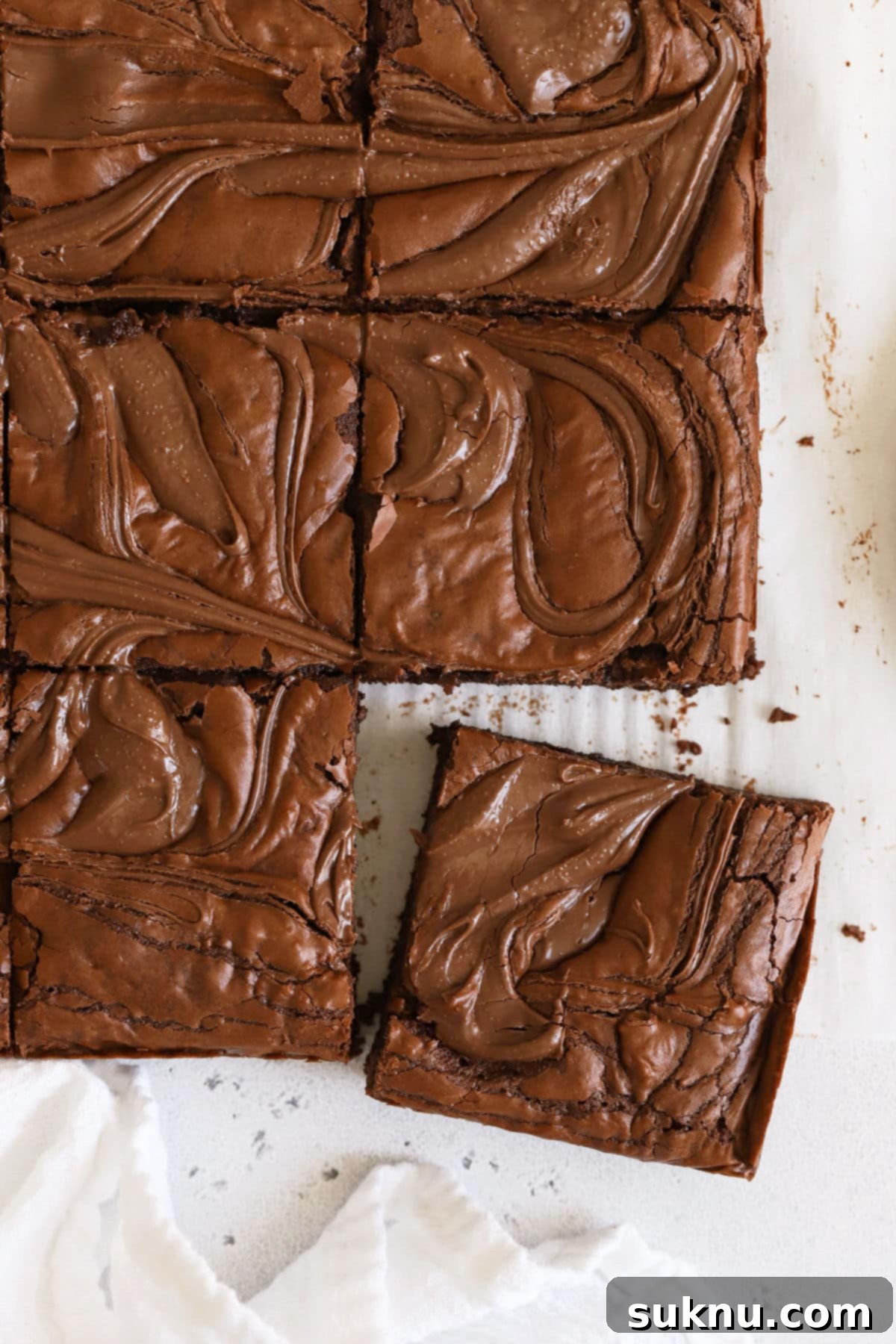 Perfectly sliced gluten-free Nutella brownies ready to be enjoyed