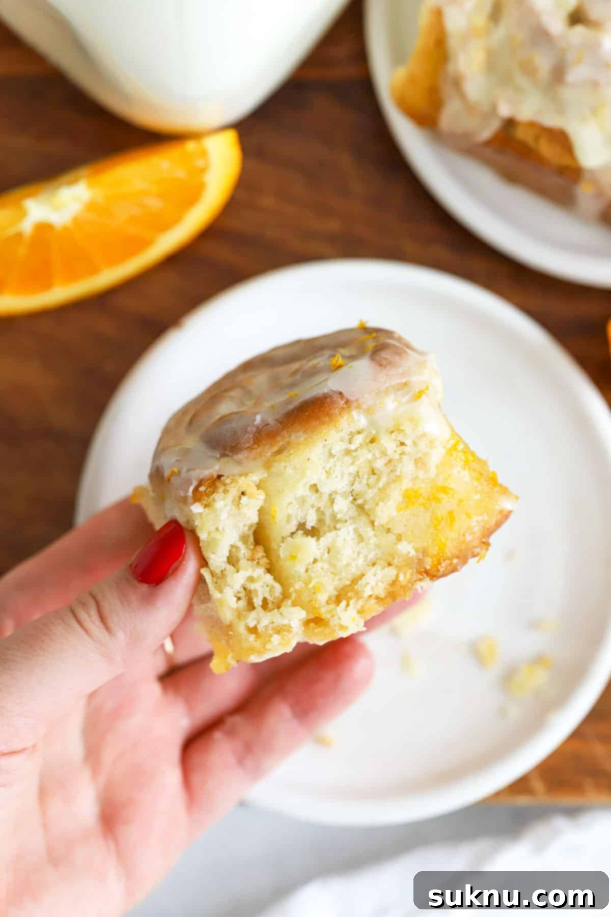 Soft, fluffy interior of a gluten-free orange sweet roll, showcasing its perfect texture.
