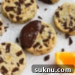 Wholesome Gluten-Free Orange Chocolate Buttery Bites 11 Gluten-Free Orange Chocolate Chunk Shortbread Cookies on parchment paper