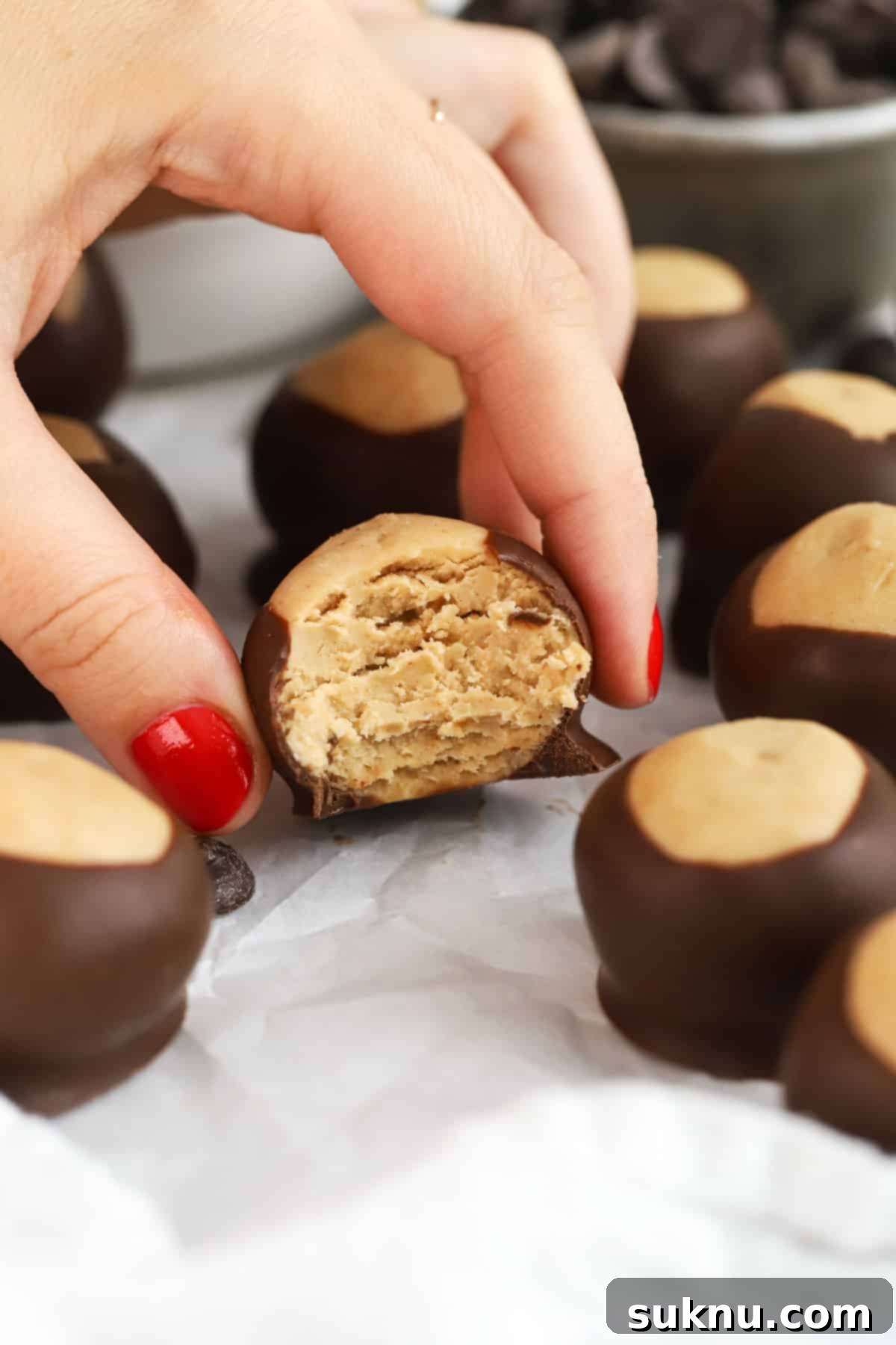 a buckeye ball with a bite taken out of it