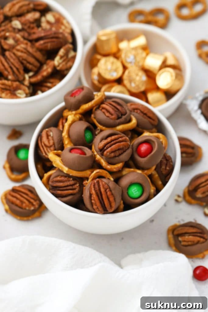 gluten-free rolo pretzel bites with m&ms and pecans