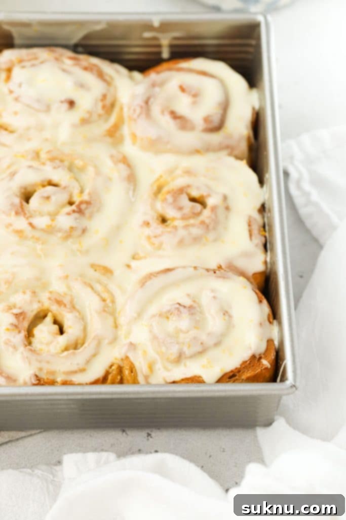 A pan of homemade gluten-free orange sweet rolls