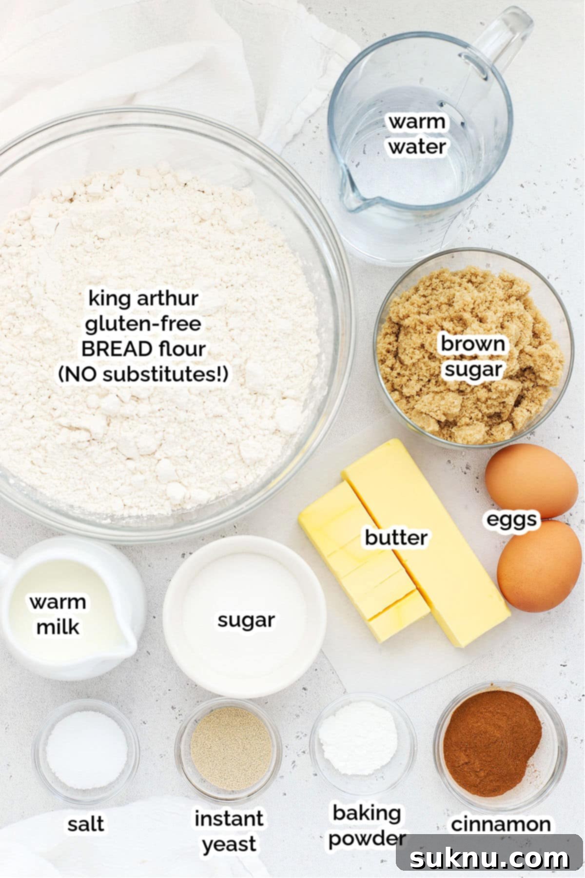 Ingredients for gluten-free cinnamon rolls laid out on a table