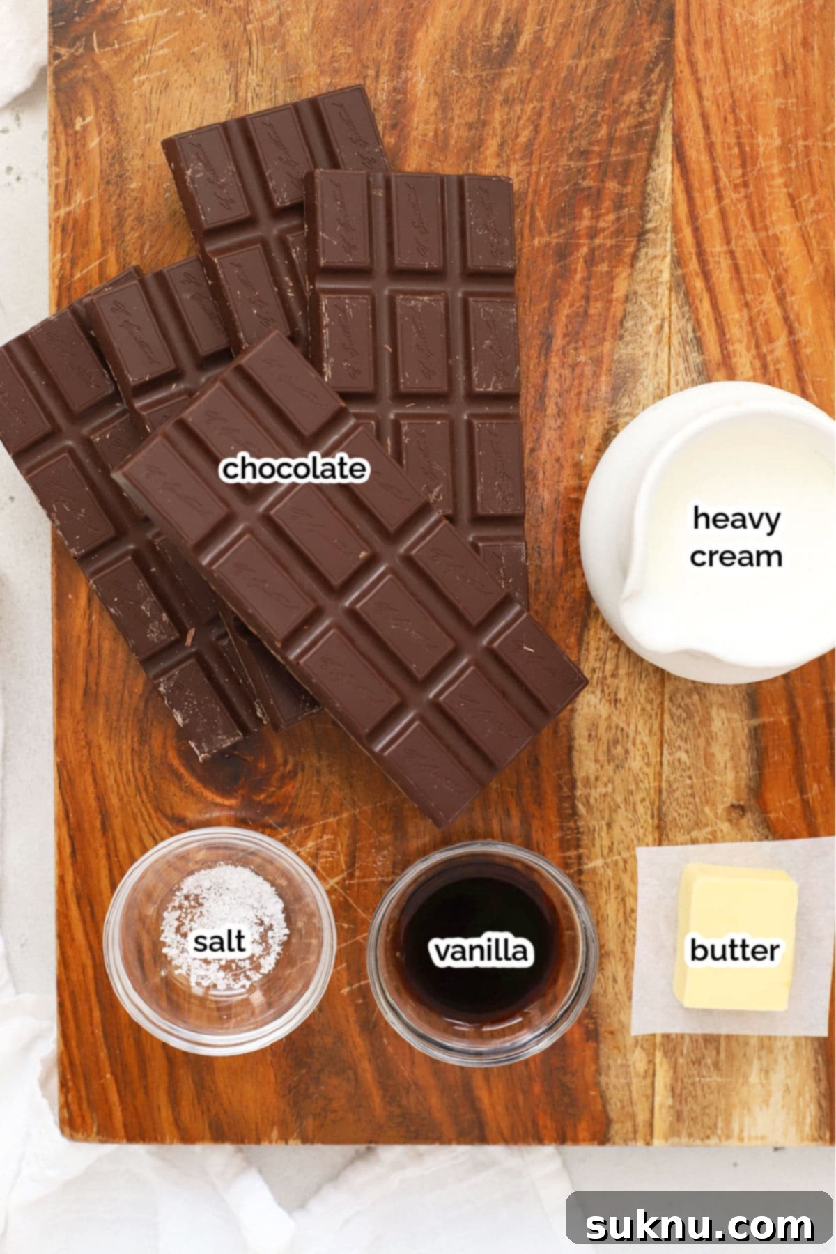 Essential ingredients for crafting a delicious gluten-free chocolate fondue, neatly arranged.