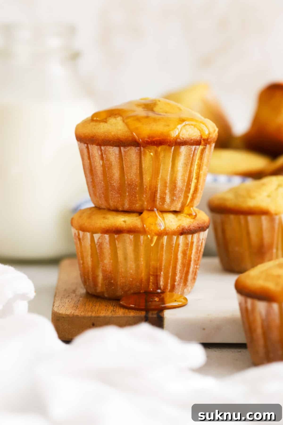 gluten-free cornbread muffins drizzled with honey