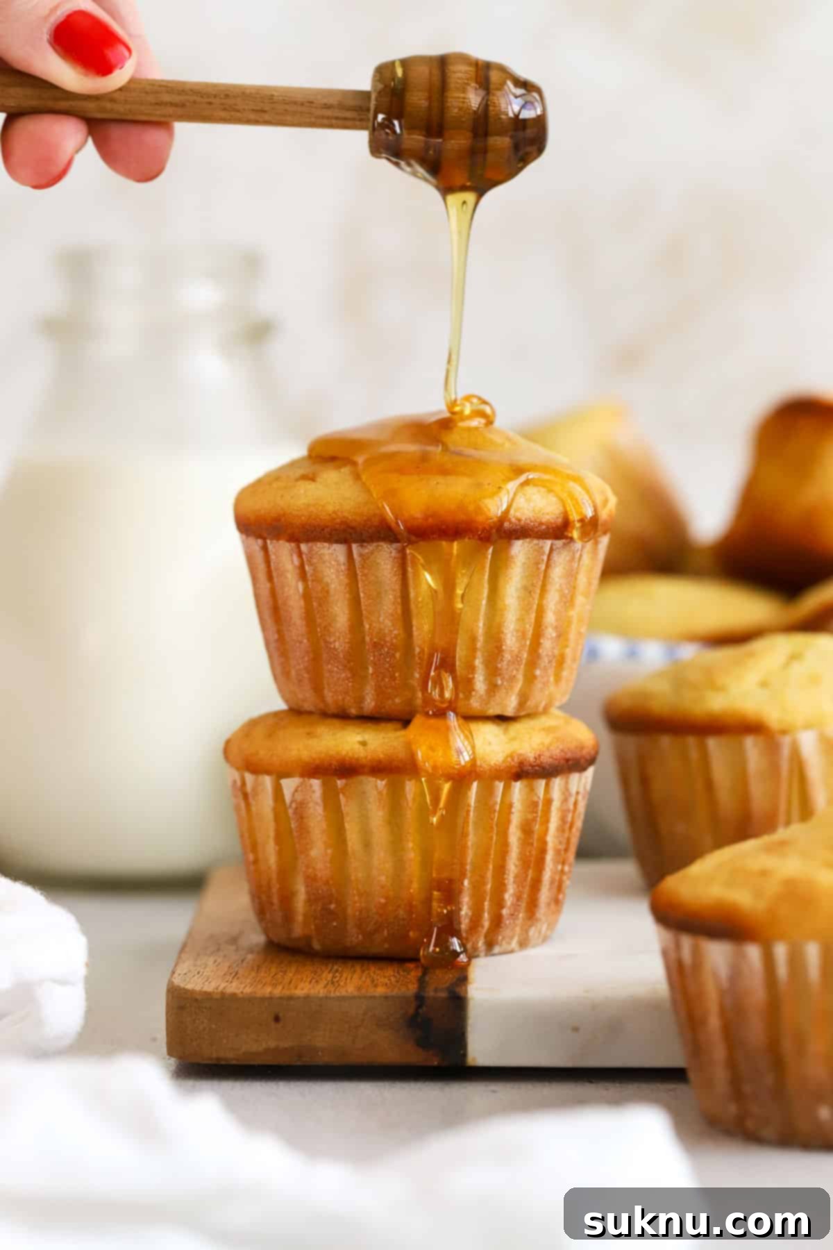 gluten-free corn muffins drizzled with honey