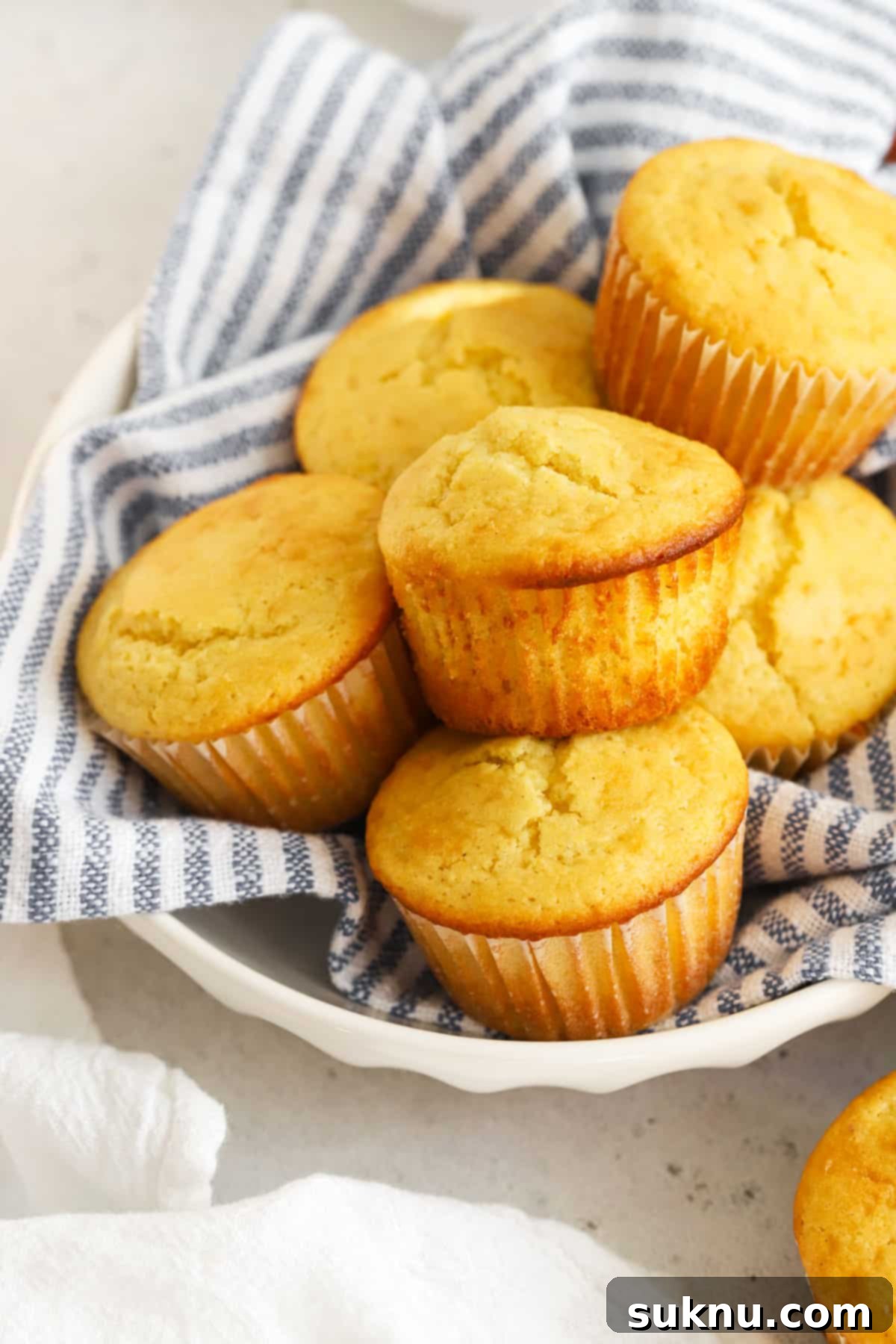 a basket of gluten-free corn muffins