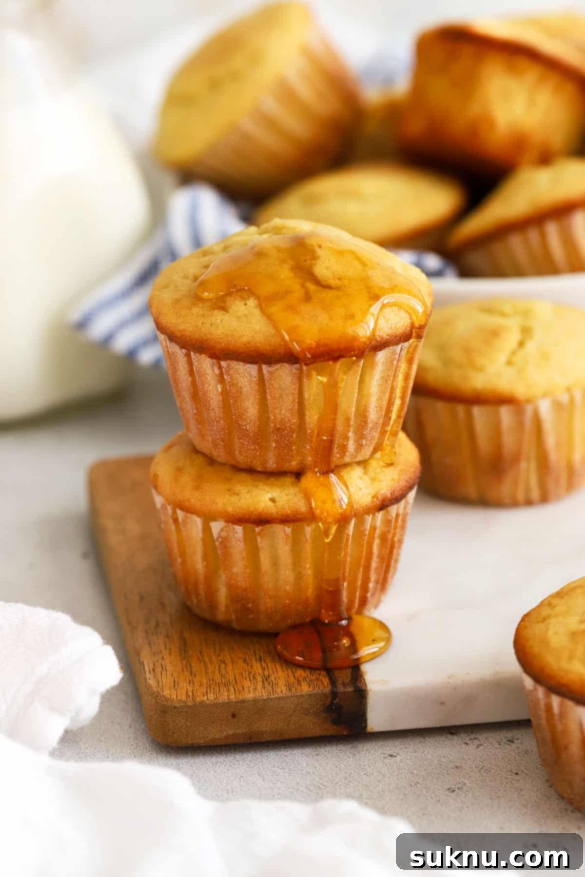 gluten-free cornbread muffins drizzled with honey
