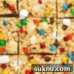 Gluten-Free M and M Rice Krispies Treats 11 gluten-free m&m rice krispie treats cut into squares