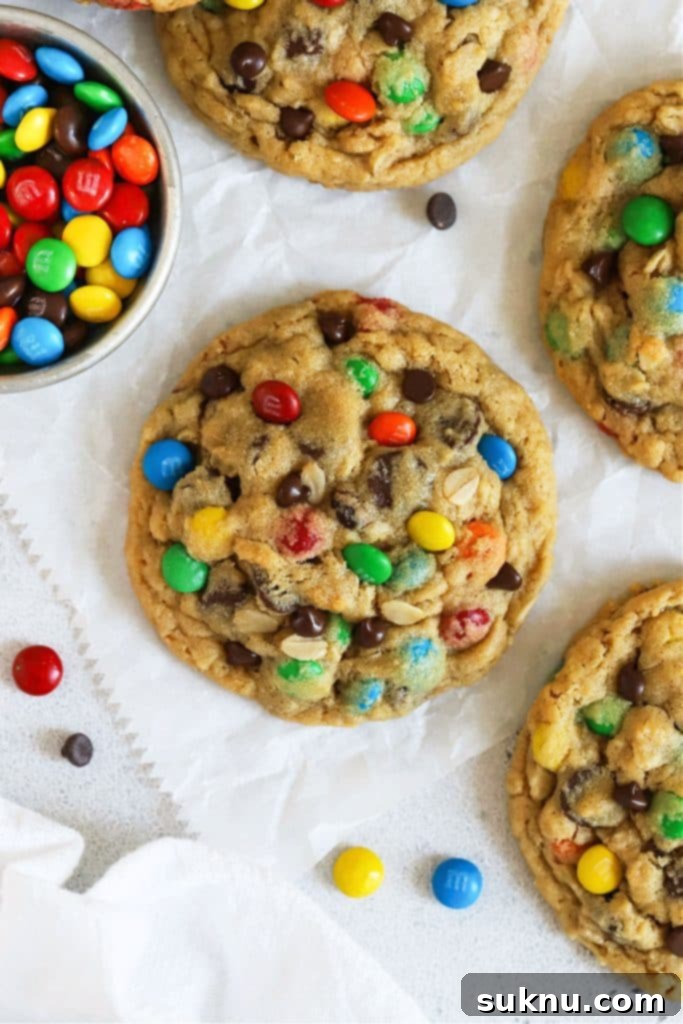 Comforting Gluten-Free Cinnamon White Chocolate Oatmeal Delights 10 gluten-free monster cookies on parchment paper