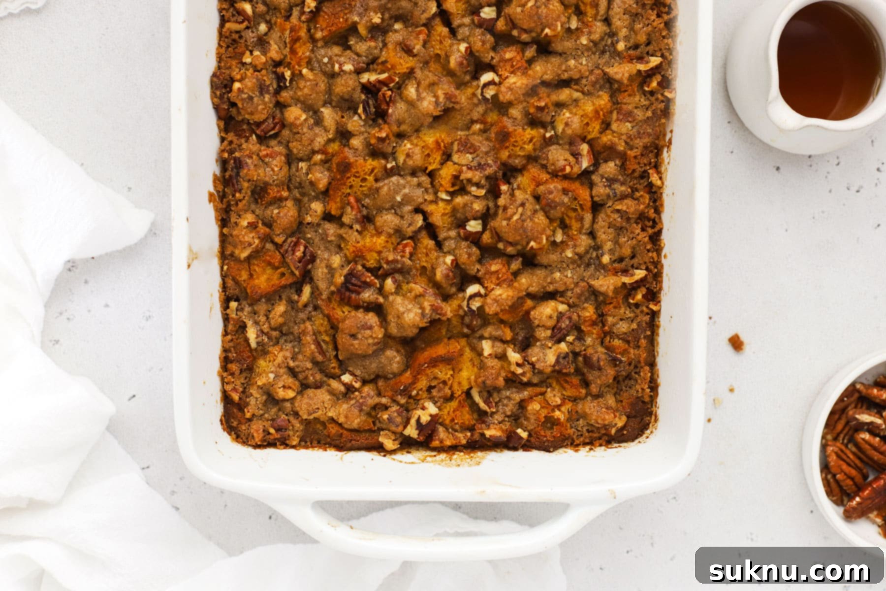 Gluten-Free Pumpkin Spice French Toast Casserole 13 Gluten-free pumpkin French toast casserole with brown sugar pecan streusel, ready to be served