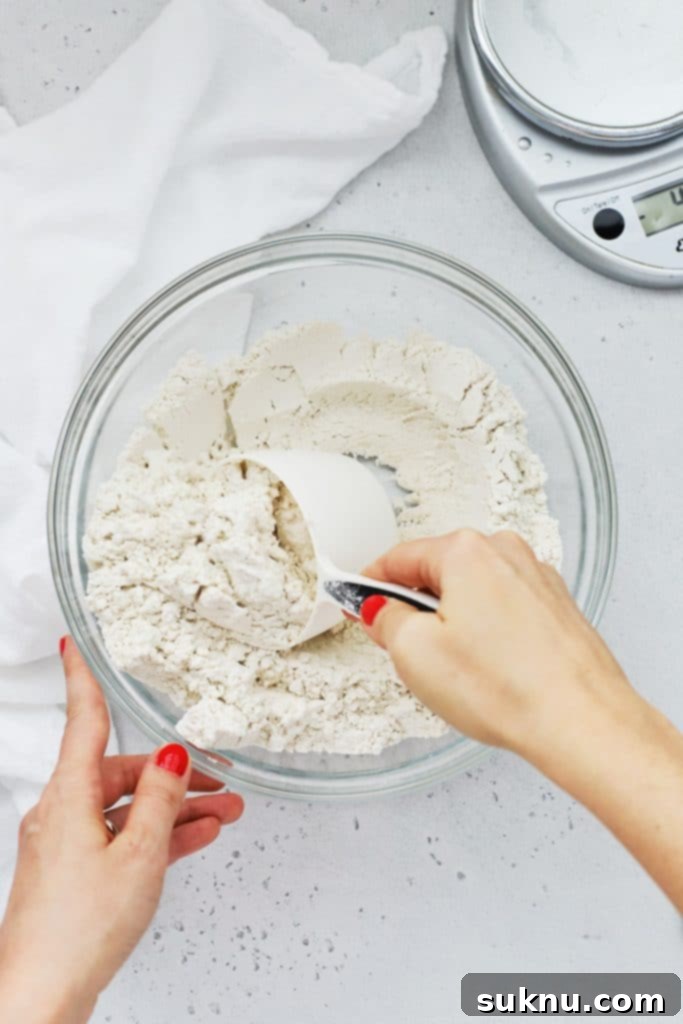 Master Flour Measurement For Perfect Baking 12 Someone incorrectly measuring flour by directly scooping with the measuring cup