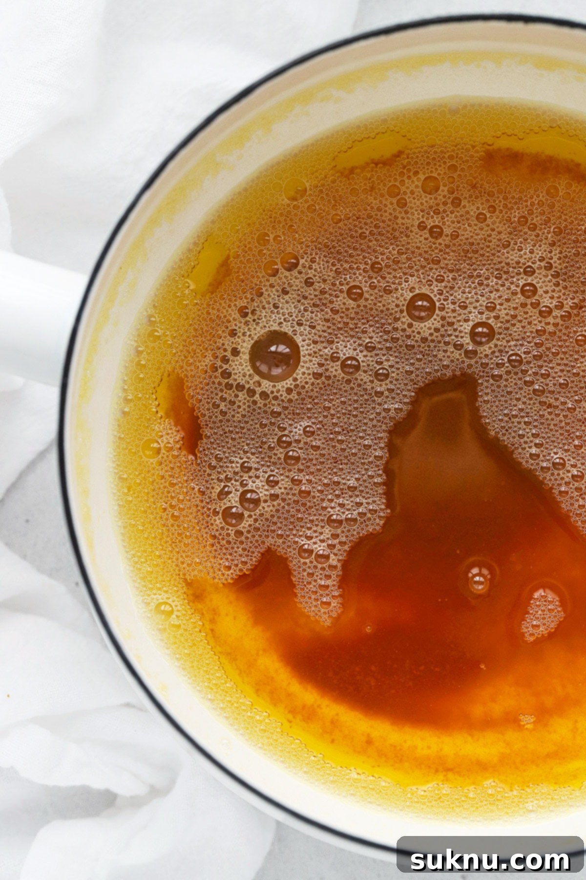 How to Brown Butter (Step-by-Step Tutorial) - Close-up of golden brown butter