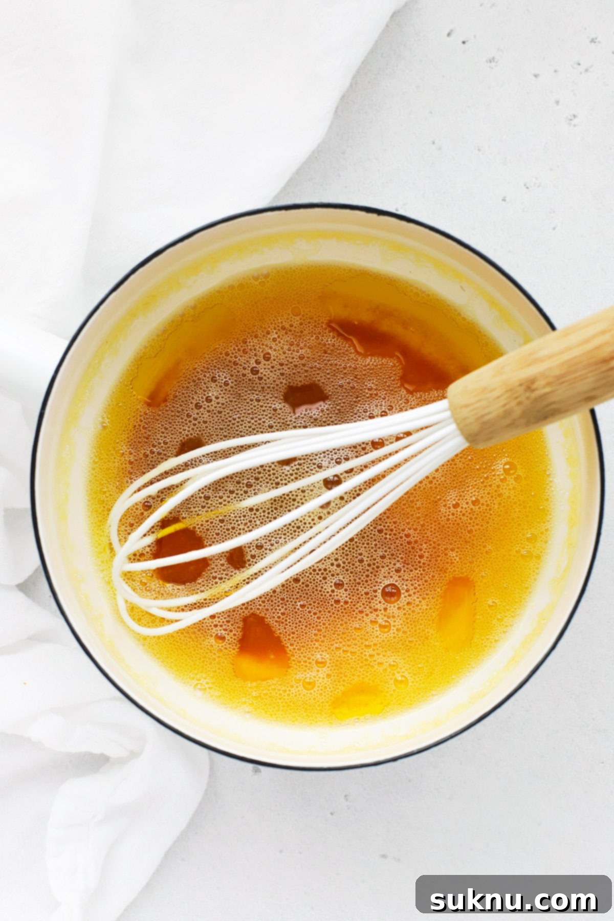 How to Brown Butter (Step-by-Step Tutorial) - Butter starting to foam in a saucepan