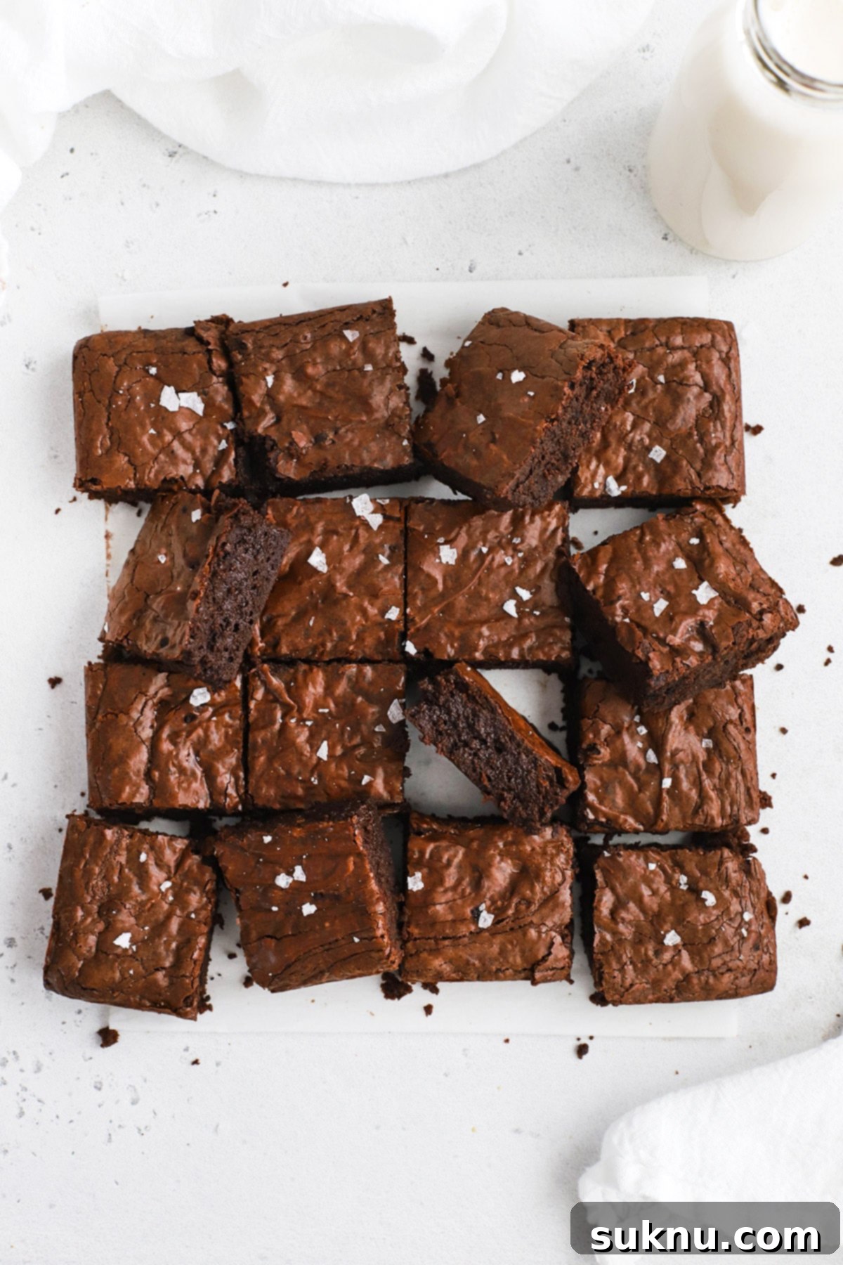 Fudgy Golden Brown Butter Gluten-Free Brownies 6 Overhead view of perfectly fudgy gluten-free brown butter brownies, neatly cut into squares and ready to enjoy.