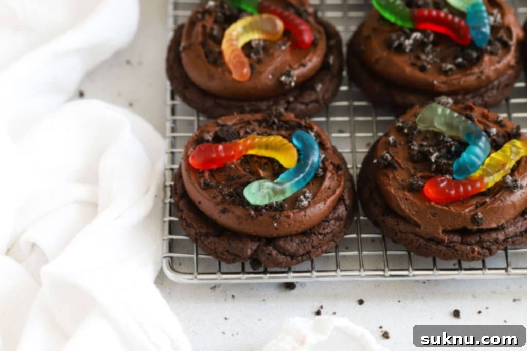 Gluten-free Crumbl style dirt pudding cookies on a wire rack.