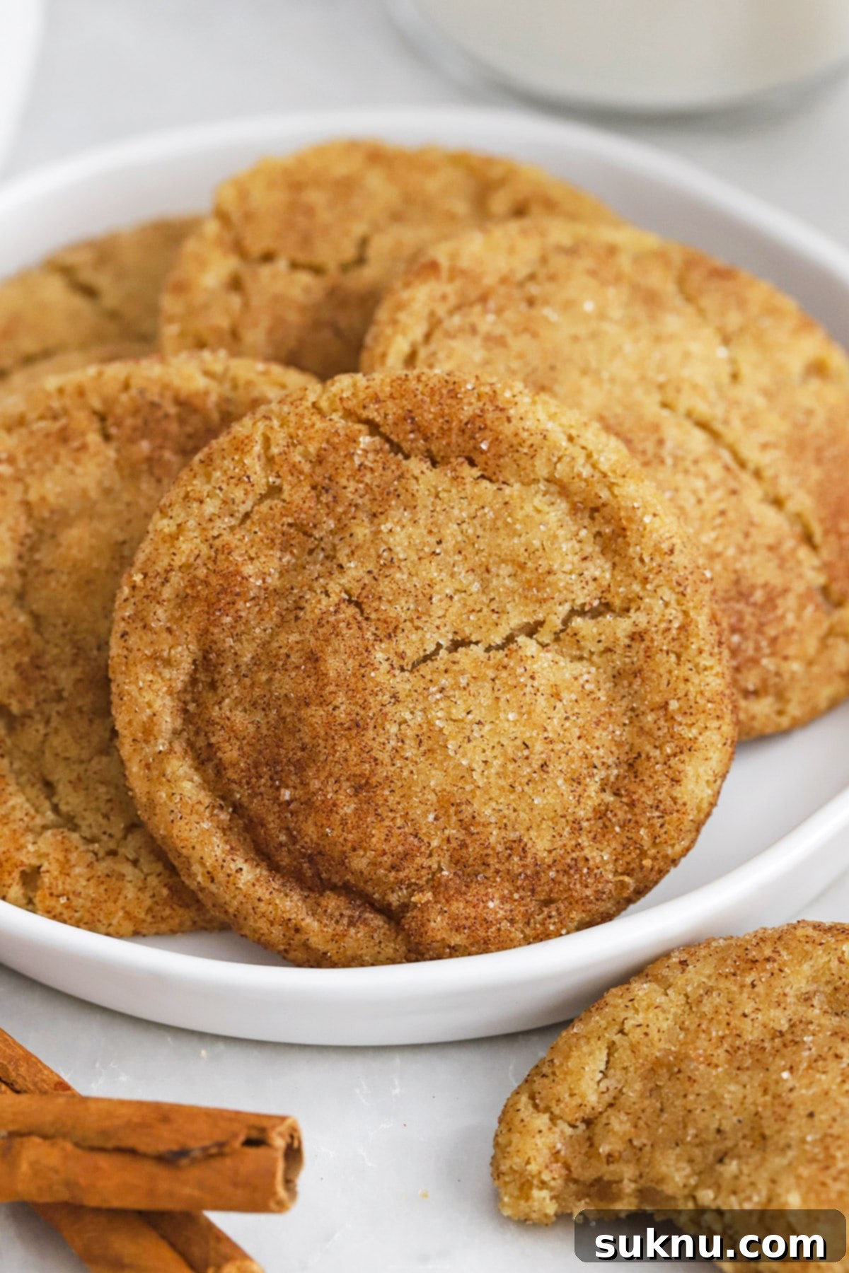 Front view of a plate of gluten-free brown butter caramel snickerdoodles