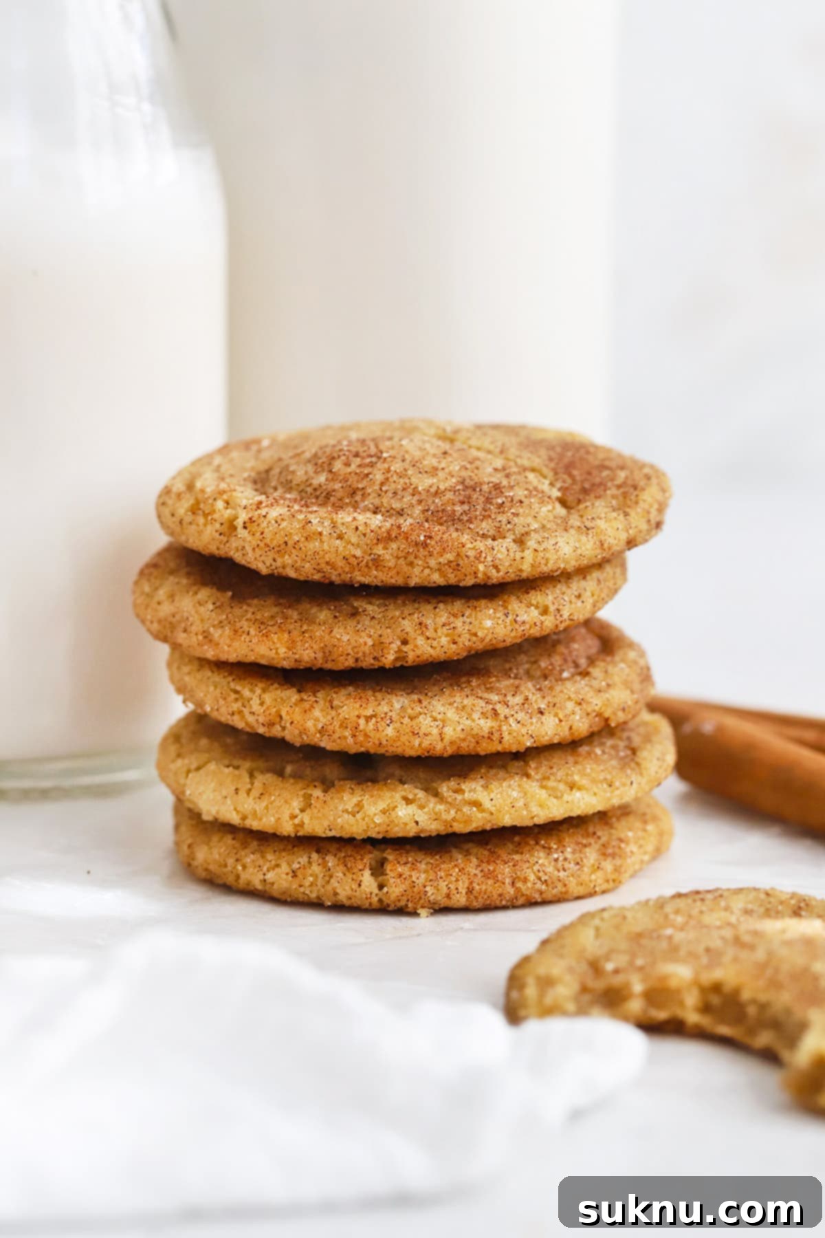 Front view of a stack of gluten-free brown butter caramel snickerdoodles