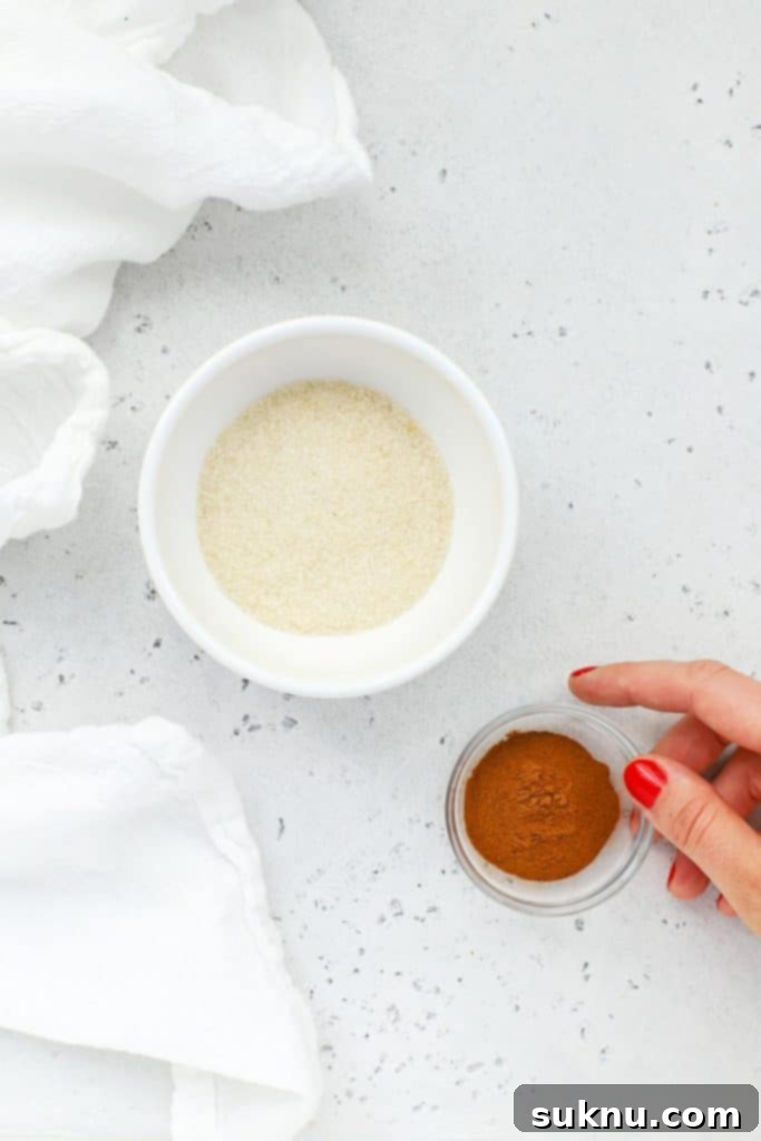 Adding cinnamon to sugar for rolling gluten-free brown butter snickerdoodles