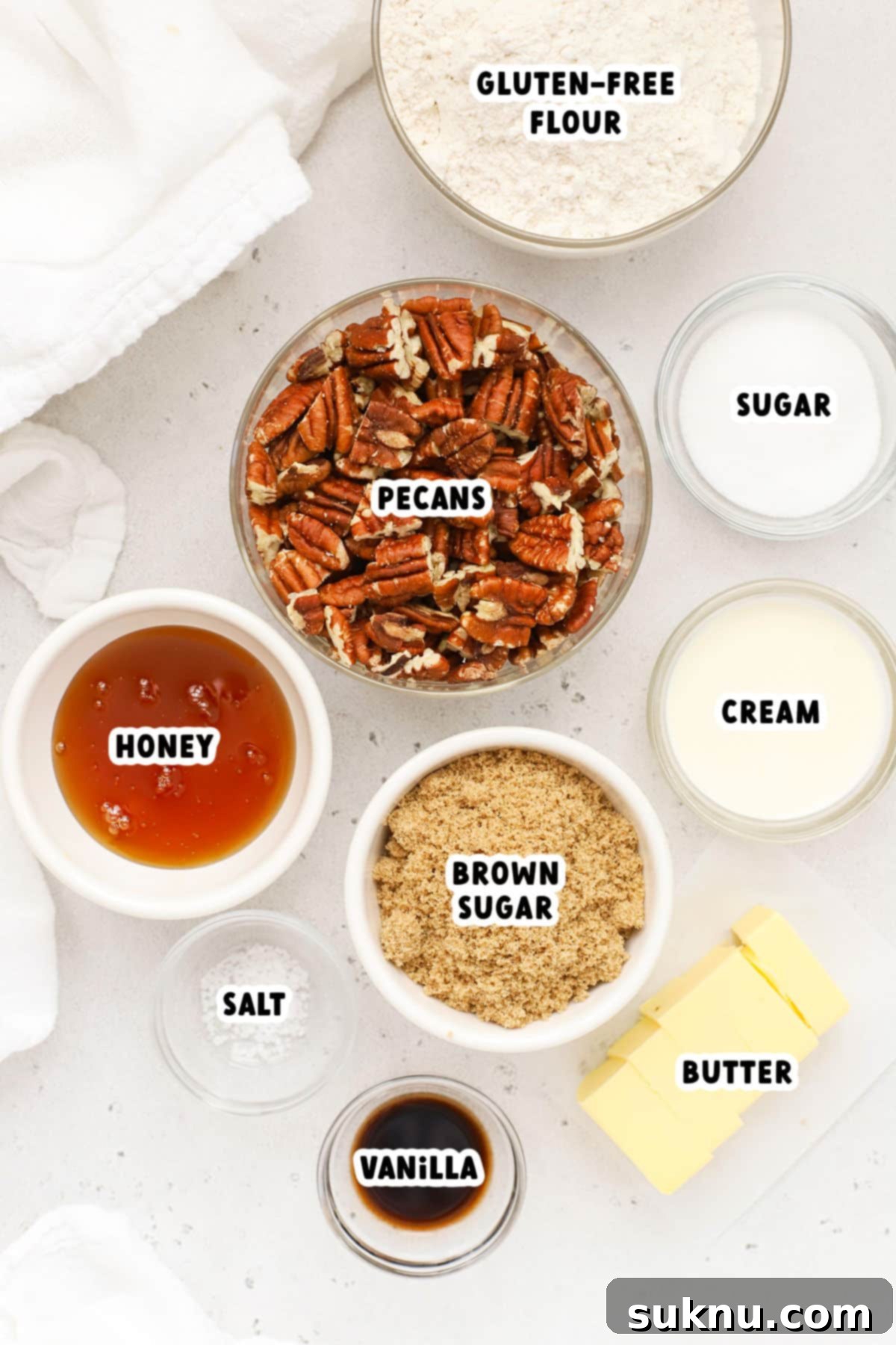 Sweet and Salty Gluten-Free Pecan Caramel Treats 3 Collection of fresh ingredients for gluten-free caramel pecan bars on a wooden surface