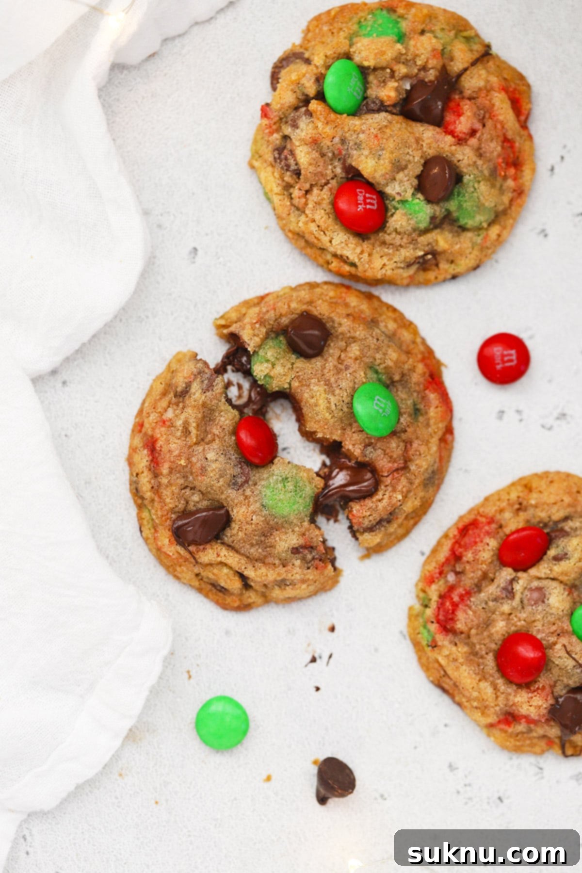 A tempting overhead shot of freshly baked gluten-free M&M cookies, golden brown and delicious, prepared directly from our convenient cookie in a jar mix.