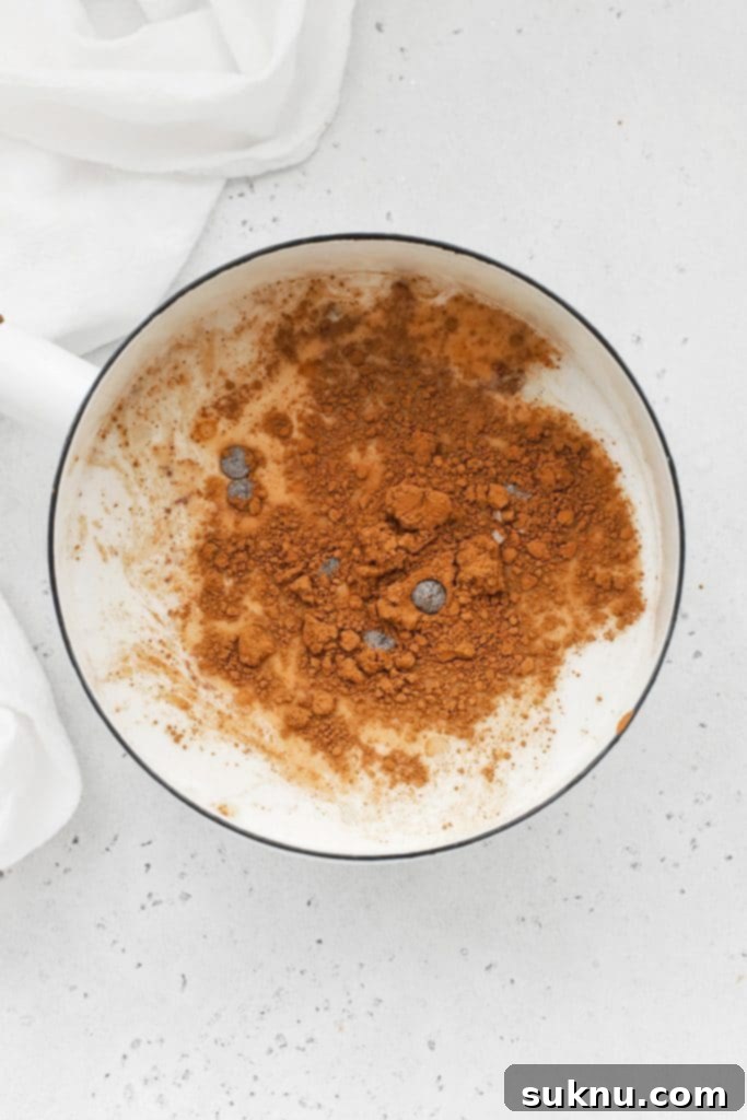 Peppermint Dream Vegan Cocoa 5 Overhead view of various ingredients laid out neatly, ready to be combined for a batch of homemade vegan peppermint hot chocolate.