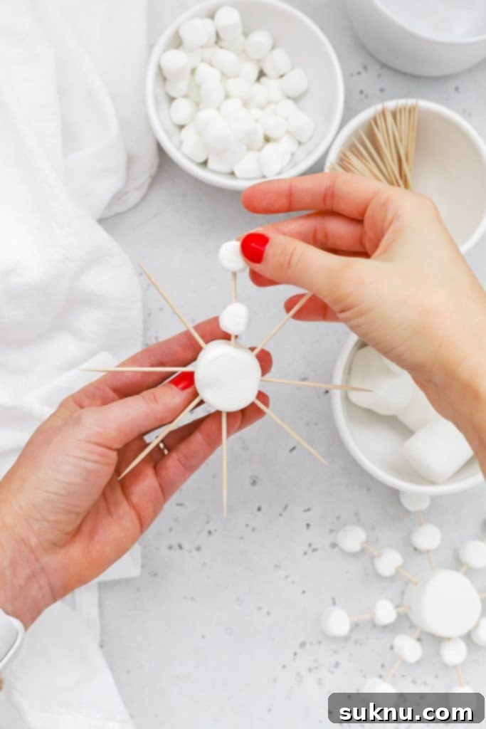 Marshmallow Snowflake Magic 8 Another perspective on decorating marshmallow snowflakes with mini marshmallows.