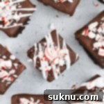 Overhead view of gluten-free peppermint brownie bites topped with crushed candy canes, showcased as a recipe card thumbnail
