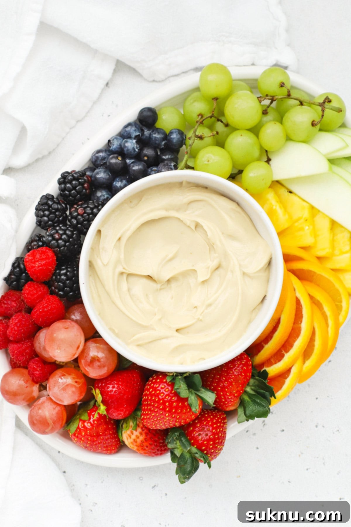 Brown Sugar Cream Cheese Fruit Dream 2 Delicious Brown Sugar Cream Cheese Fruit Dip served with a vibrant rainbow of fresh fruit slices