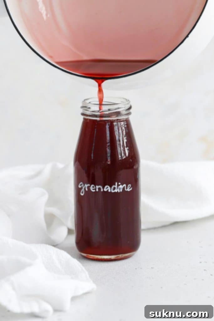 Easy Homemade Grenadine Three Ingredients 8 Front view of homemade grenadine syrup for mocktails