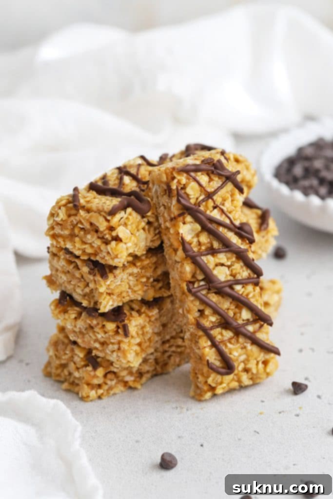 Front view of healthy peanut butter granola bars drizzled with chocolate
