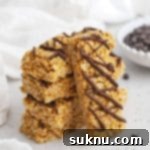 Front view of healthy peanut butter granola bars drizzled with chocolate