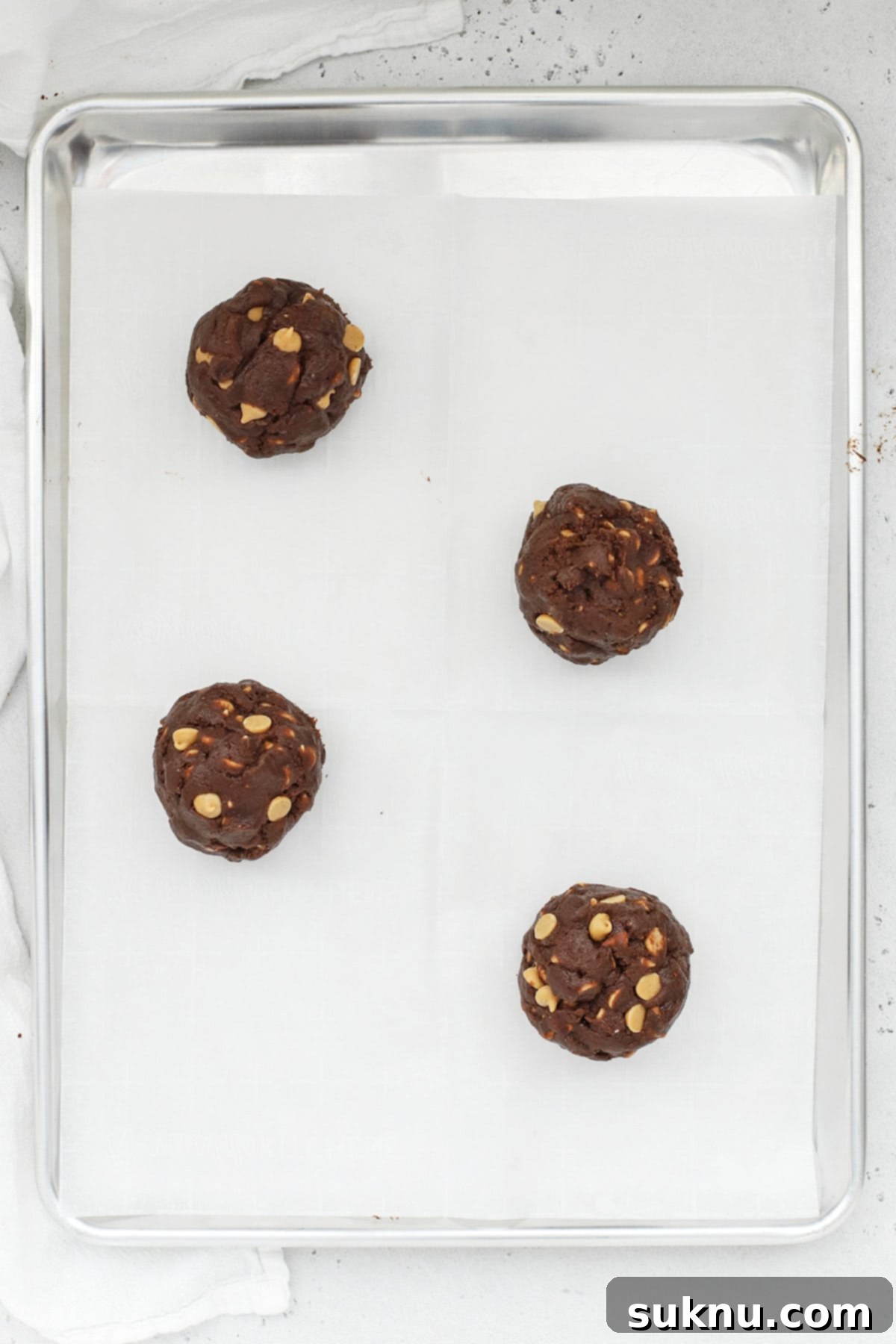 gluten-free Levain-style dark chocolate peanut butter chip cookies, ready to go into the oven