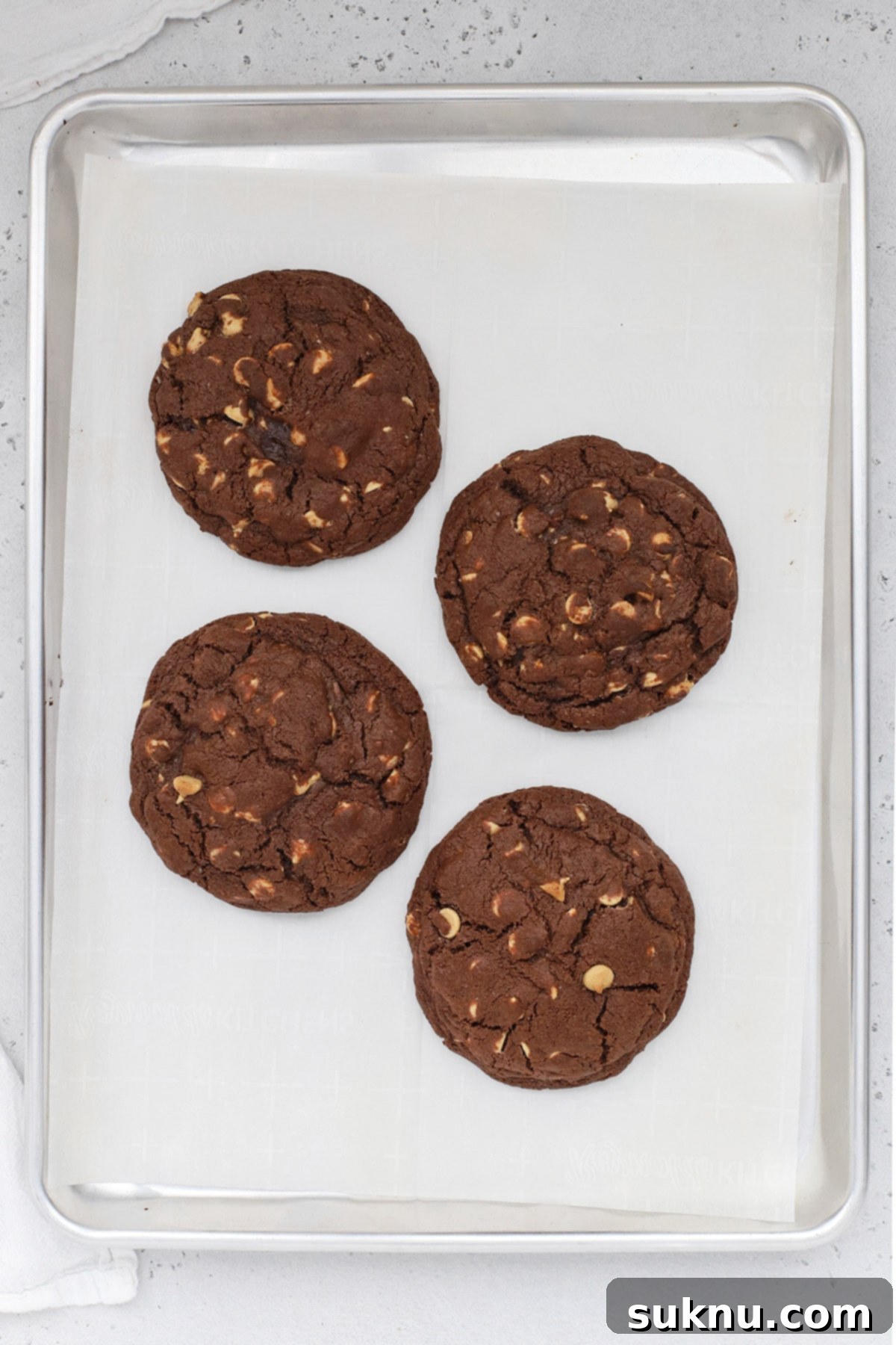 Freshly baked gluten-free Levain-style dark chocolate peanut butter chip cookies