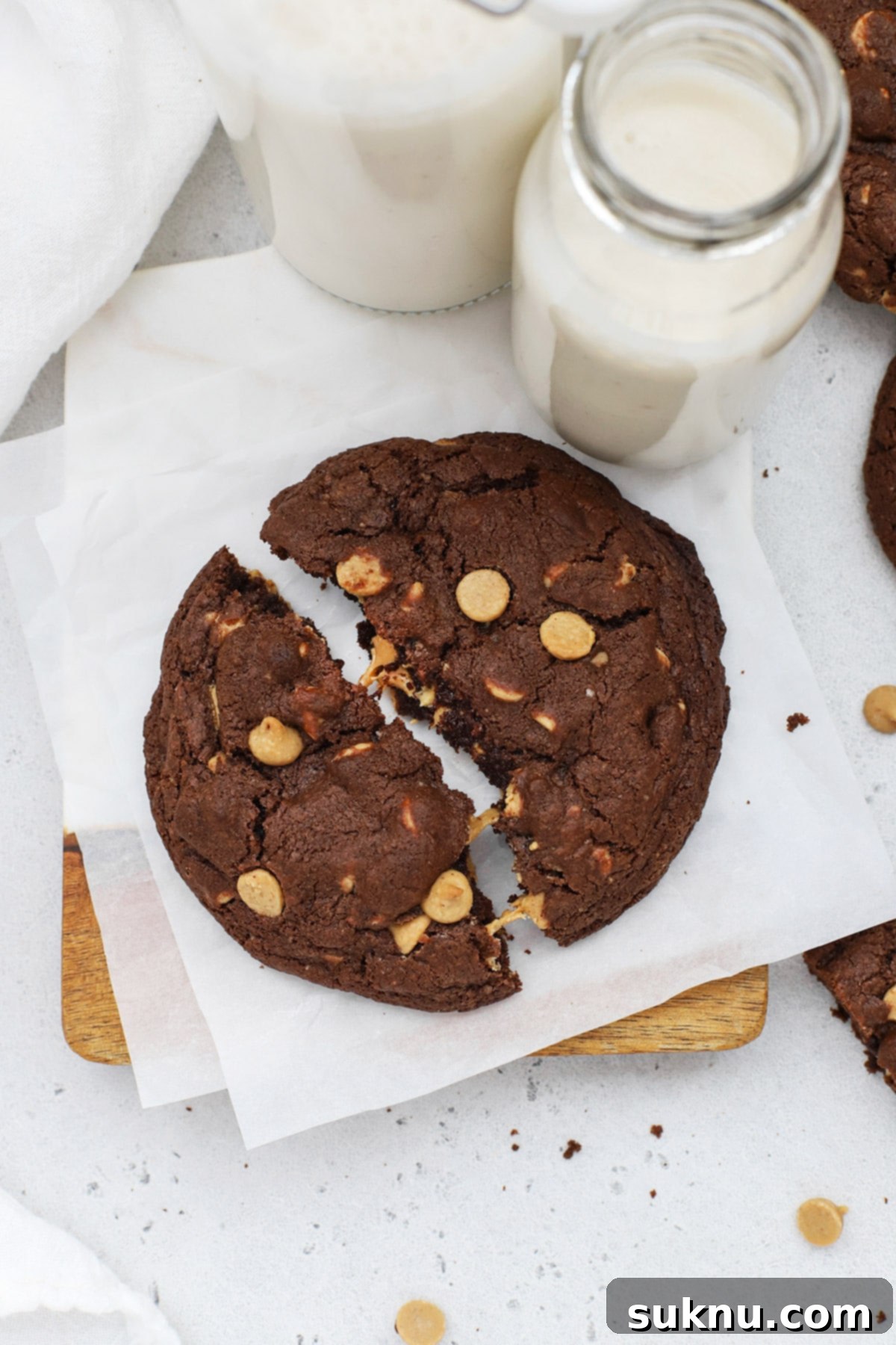 Overhead view of a gluten-free Levain-style dark chocolate peanut butter chip cookie