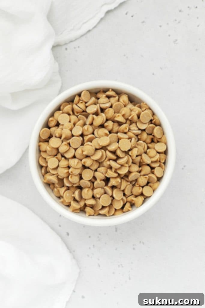 Overhead view of a bowl of Reese's peanut butter chips for thick gluten-free chocolate peanut butter chip cookies