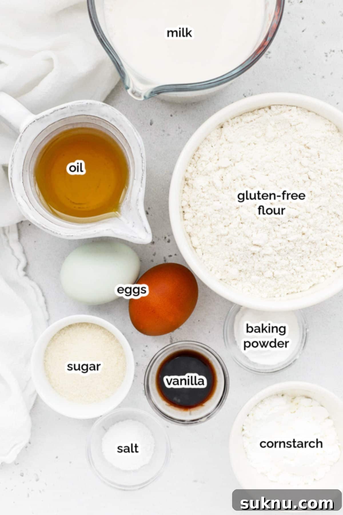 Assortment of ingredients laid out for making gluten-free Belgian waffles