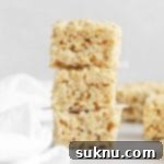 Three gluten-free krispies treats stacked on top of each other