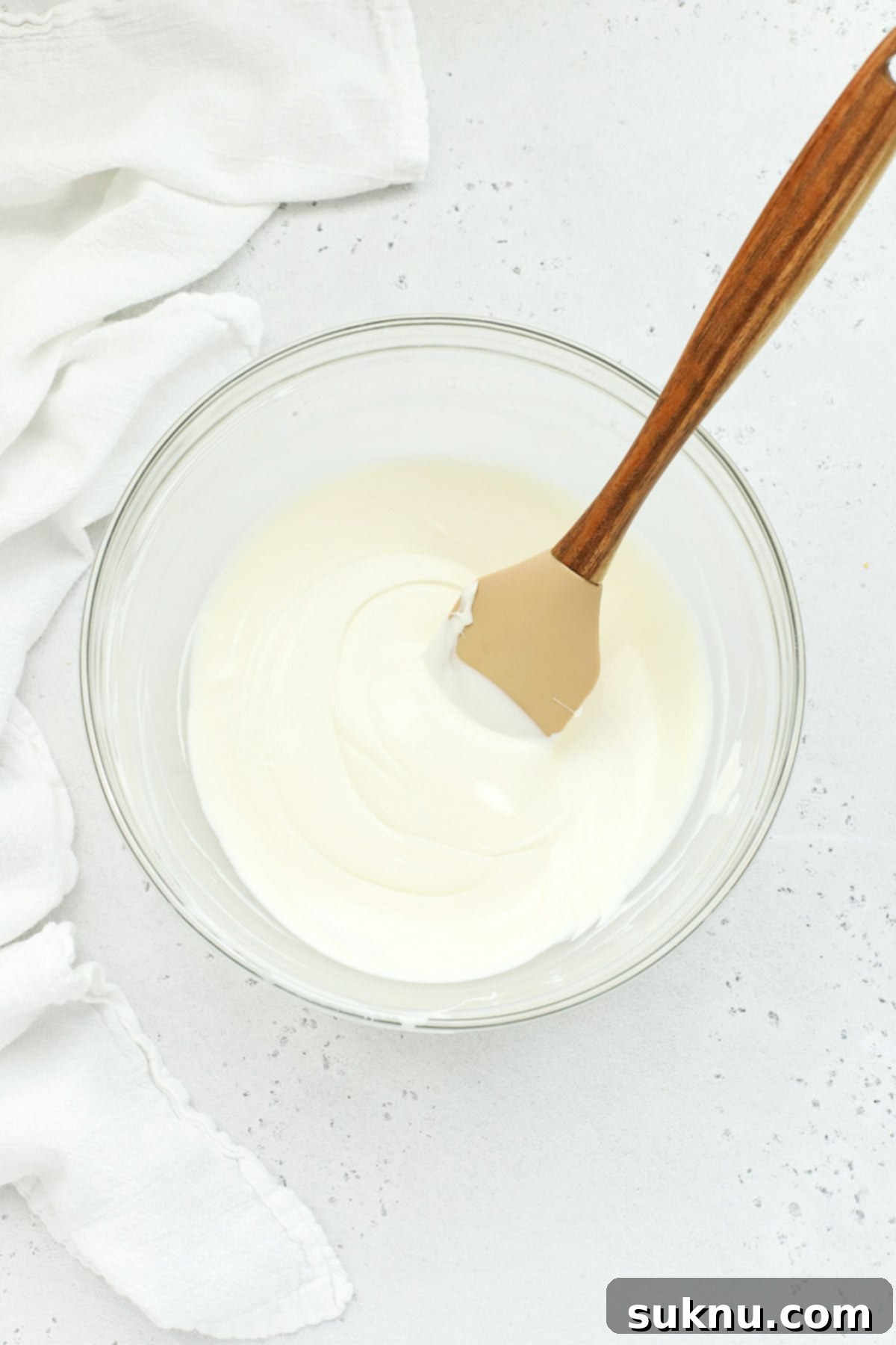 Gluten-Free Easter Bunny Bait Chex Mix 7 Vanilla almond bark, melted in a bowl