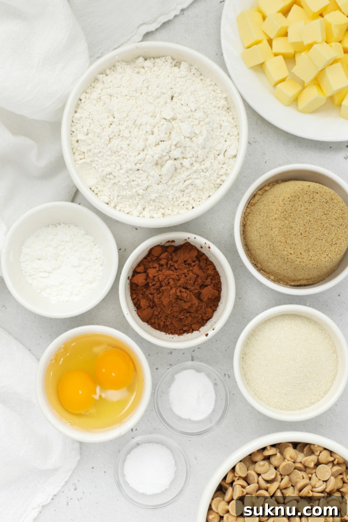 Are Your Baking Powder and Soda Still Potent 4 Array of baking ingredients for gluten-free cookies, including fresh baking powder and baking soda, on a wooden surface.