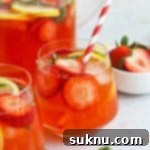 Strawberry Basil Bliss Lemonade 11 Front view of a glass of homemade strawberry basil lemonade