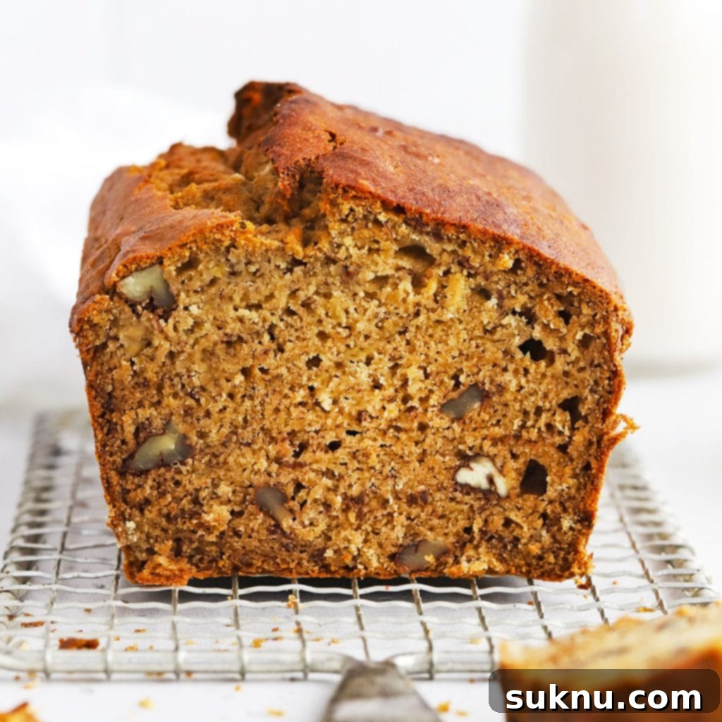 Decadent Gluten-Free Chocolate Banana Bread 11 A perfectly sliced loaf of banana bread, revealing its moist, tender, and evenly cooked interior.