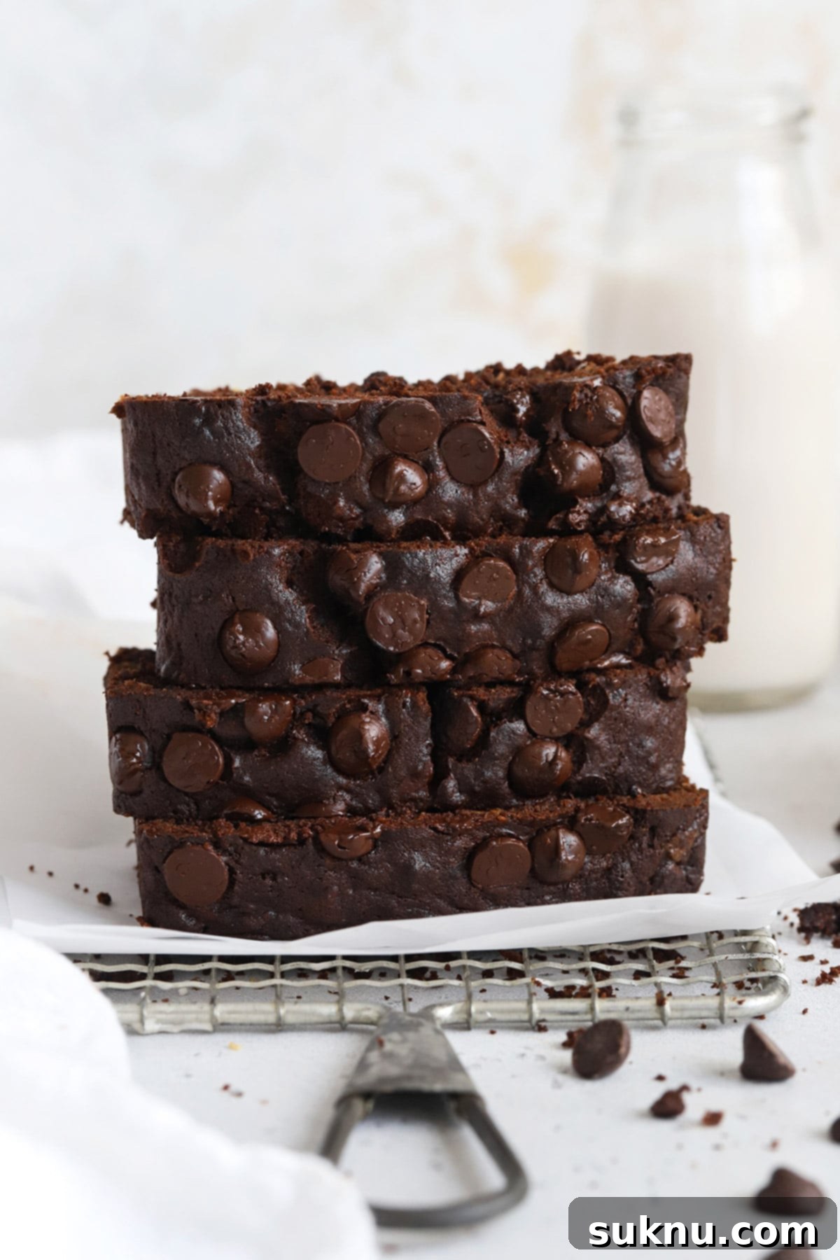 Decadent Gluten-Free Chocolate Banana Bread 14 Another front view of stacked gluten-free chocolate banana bread slices, highlighting their inviting, rich color and tender crumb, ready to be enjoyed.